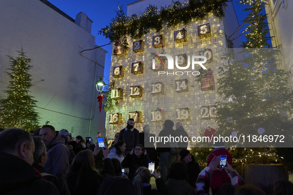 In Locorotondo, Italy, on December 7, 2024, the historic center transforms into a Christmas wonderland. Through self-funding efforts, the vi...