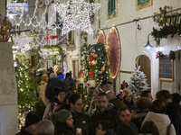 In Locorotondo, Italy, on December 7, 2024, the historic center transforms into a Christmas wonderland. Through self-funding efforts, the vi...