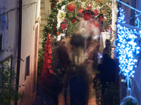 In Locorotondo, Italy, on December 7, 2024, the historic center transforms into a Christmas wonderland. Through self-funding efforts, the vi...