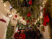 In Locorotondo, Italy, on December 7, 2024, the historic center transforms into a Christmas wonderland. Through self-funding efforts, the vi...