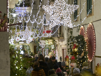 In Locorotondo, Italy, on December 7, 2024, the historic center transforms into a Christmas wonderland. Through self-funding efforts, the vi...