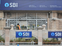 A person enters an SBI bank Global trade finance center in Kolkata, India, on December 8, 2024. (