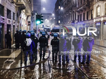 Demonstrators clash with police outside the Prima della Scala 2024 of Giuseppe Verdi's opera La Forza del Destino in Milan, Italy, on Decemb...