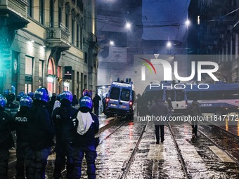 Demonstrators clash with police outside the Prima della Scala 2024 of Giuseppe Verdi's opera La Forza del Destino in Milan, Italy, on Decemb...