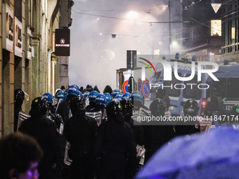 Demonstrators clash with police outside the Prima della Scala 2024 of Giuseppe Verdi's opera La Forza del Destino in Milan, Italy, on Decemb...