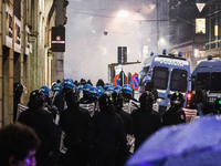 Demonstrators clash with police outside the Prima della Scala 2024 of Giuseppe Verdi's opera La Forza del Destino in Milan, Italy, on Decemb...