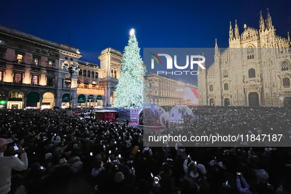 A moment of the lighting ceremony of the Christmas tree of the Olympic and Paralympic Games takes place in Piazza Duomo in Milan, Italy, on...