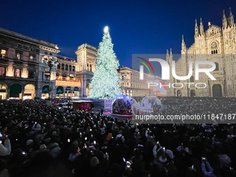 A moment of the lighting ceremony of the Christmas tree of the Olympic and Paralympic Games takes place in Piazza Duomo in Milan, Italy, on...