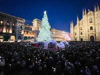 A moment of the lighting ceremony of the Christmas tree of the Olympic and Paralympic Games takes place in Piazza Duomo in Milan, Italy, on...