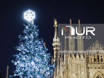 A moment of the lighting ceremony of the Christmas tree of the Olympic and Paralympic Games takes place in Piazza Duomo in Milan, Italy, on...