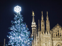 A moment of the lighting ceremony of the Christmas tree of the Olympic and Paralympic Games takes place in Piazza Duomo in Milan, Italy, on...