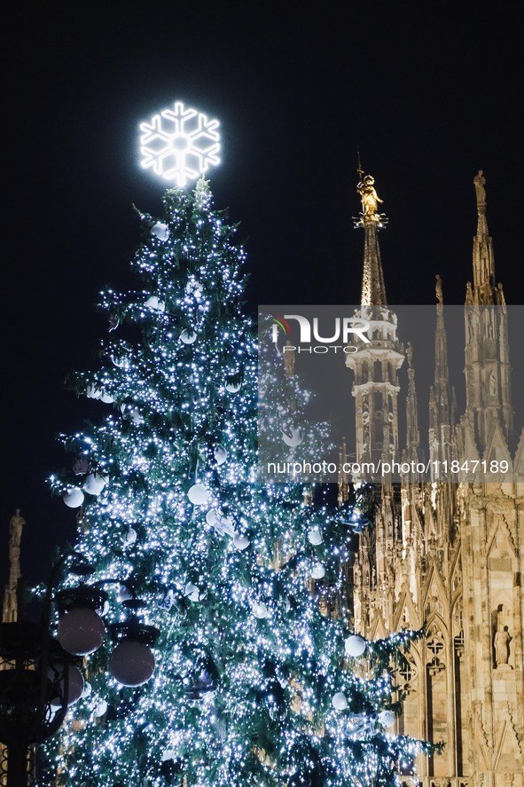 A moment of the lighting ceremony of the Christmas tree of the Olympic and Paralympic Games takes place in Piazza Duomo in Milan, Italy, on...