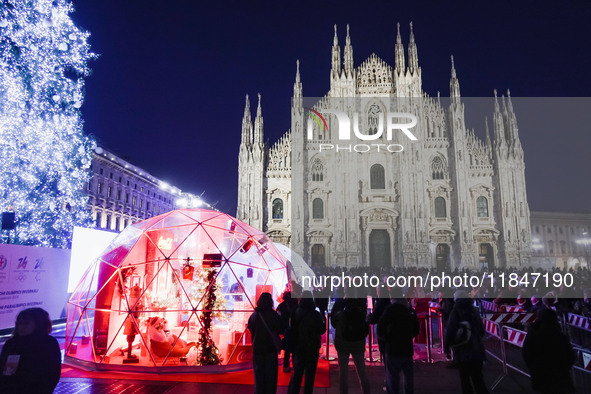 A moment of the lighting ceremony of the Christmas tree of the Olympic and Paralympic Games takes place in Piazza Duomo in Milan, Italy, on...