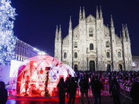 A moment of the lighting ceremony of the Christmas tree of the Olympic and Paralympic Games takes place in Piazza Duomo in Milan, Italy, on...