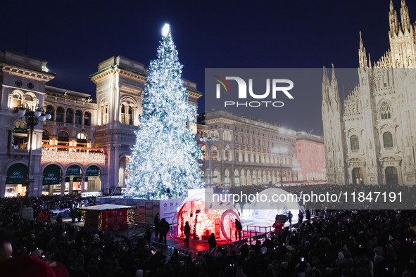 A moment of the lighting ceremony of the Christmas tree of the Olympic and Paralympic Games takes place in Piazza Duomo in Milan, Italy, on...