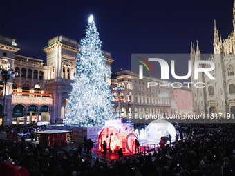 A moment of the lighting ceremony of the Christmas tree of the Olympic and Paralympic Games takes place in Piazza Duomo in Milan, Italy, on...