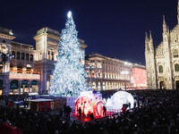 A moment of the lighting ceremony of the Christmas tree of the Olympic and Paralympic Games takes place in Piazza Duomo in Milan, Italy, on...