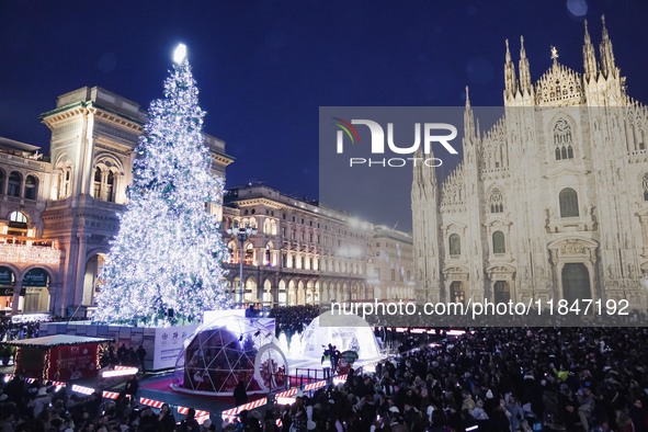 A moment of the lighting ceremony of the Christmas tree of the Olympic and Paralympic Games takes place in Piazza Duomo in Milan, Italy, on...