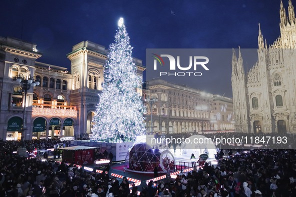 A moment of the lighting ceremony of the Christmas tree of the Olympic and Paralympic Games takes place in Piazza Duomo in Milan, Italy, on...