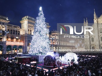 A moment of the lighting ceremony of the Christmas tree of the Olympic and Paralympic Games takes place in Piazza Duomo in Milan, Italy, on...