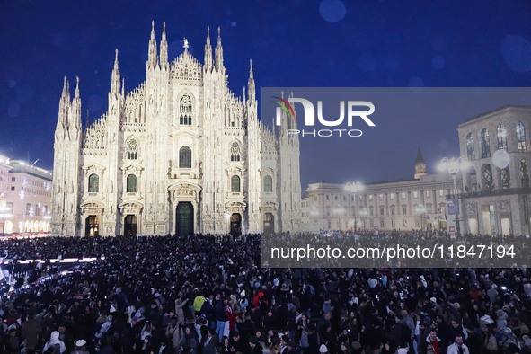 A moment of the lighting ceremony of the Christmas tree of the Olympic and Paralympic Games takes place in Piazza Duomo in Milan, Italy, on...