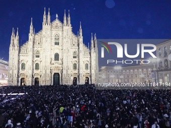 A moment of the lighting ceremony of the Christmas tree of the Olympic and Paralympic Games takes place in Piazza Duomo in Milan, Italy, on...