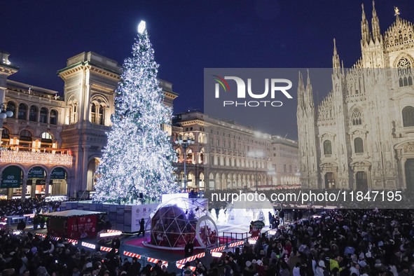 A moment of the lighting ceremony of the Christmas tree of the Olympic and Paralympic Games takes place in Piazza Duomo in Milan, Italy, on...