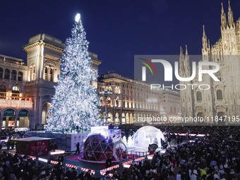 A moment of the lighting ceremony of the Christmas tree of the Olympic and Paralympic Games takes place in Piazza Duomo in Milan, Italy, on...