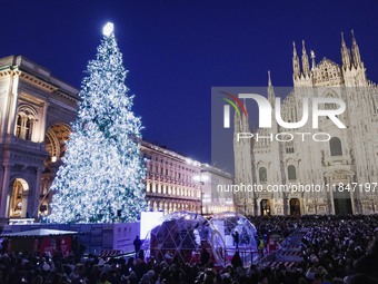 A moment of the lighting ceremony of the Christmas tree of the Olympic and Paralympic Games takes place in Piazza Duomo in Milan, Italy, on...