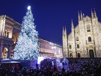 A moment of the lighting ceremony of the Christmas tree of the Olympic and Paralympic Games takes place in Piazza Duomo in Milan, Italy, on...