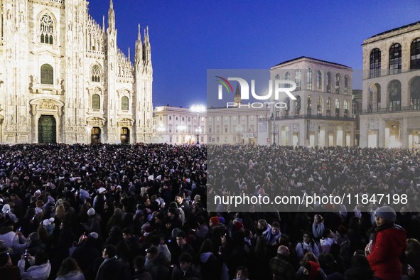 A moment of the lighting ceremony of the Christmas tree of the Olympic and Paralympic Games takes place in Piazza Duomo in Milan, Italy, on...