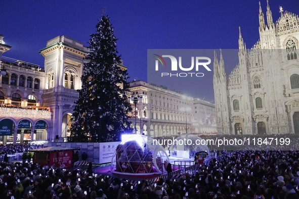 A moment of the lighting ceremony of the Christmas tree of the Olympic and Paralympic Games takes place in Piazza Duomo in Milan, Italy, on...