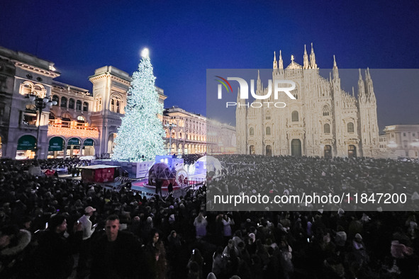 A moment of the lighting ceremony of the Christmas tree of the Olympic and Paralympic Games takes place in Piazza Duomo in Milan, Italy, on...