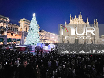 A moment of the lighting ceremony of the Christmas tree of the Olympic and Paralympic Games takes place in Piazza Duomo in Milan, Italy, on...