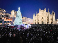 A moment of the lighting ceremony of the Christmas tree of the Olympic and Paralympic Games takes place in Piazza Duomo in Milan, Italy, on...