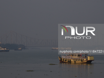 The Ganga River is on a foggy morning amid rising air pollution levels in Kolkata, India, on December 08, 2024. According to the Central Pol...