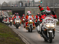 KRAKOW, POLAND - DECEMBER 08: Hundreds of motorcycle riders dressed as Santa Claus on their way to deliver Christmas gifts to young patients...