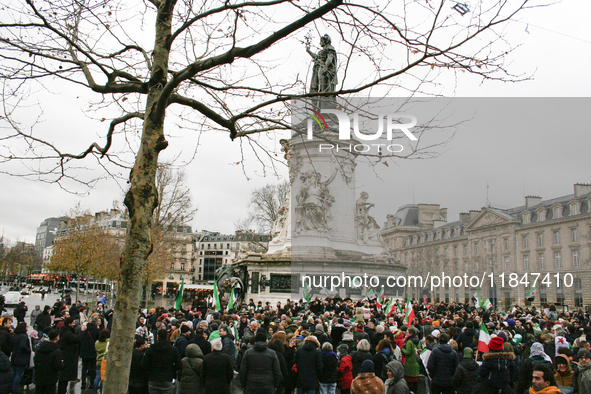 A demonstration by the Syrian community takes place at Place de la Republique in Paris, France, on December 8, 2024, to celebrate Syria's fr...