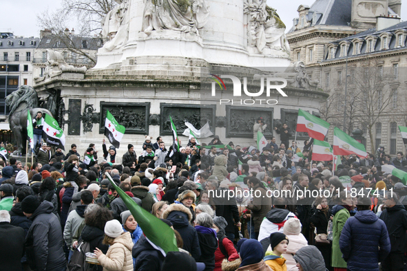 A demonstration by the Syrian community takes place at Place de la Republique in Paris, France, on December 8, 2024, to celebrate Syria's fr...