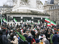 A demonstration by the Syrian community takes place at Place de la Republique in Paris, France, on December 8, 2024, to celebrate Syria's fr...