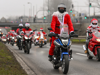 KRAKOW, POLAND - DECEMBER 08: Hundreds of motorcycle riders dressed as Santa Claus on their way to deliver Christmas gifts to young patients...