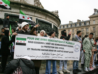 A demonstration by the Syrian community takes place at Place de la Republique in Paris, France, on December 8, 2024, to celebrate Syria's fr...