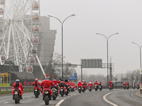 KRAKOW, POLAND - DECEMBER 08: Hundreds of motorcycle riders dressed as Santa Claus on their way to deliver Christmas gifts to young patients...