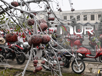 KRAKOW, POLAND - DECEMBER 08: Hundreds of motorcycles parked outside the Pediatric Hospital in Krakow as Santa Clauses deliver Christmas gif...