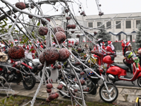 KRAKOW, POLAND - DECEMBER 08: Hundreds of motorcycles parked outside the Pediatric Hospital in Krakow as Santa Clauses deliver Christmas gif...