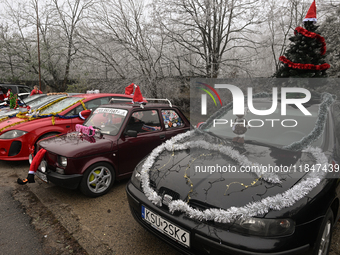 KRAKOW, POLAND - DECEMBER 08: Christmas decorations seen of cars parked outside the Pediatric Hospital in Krakow as Santa Clauses deliver Ch...