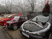 KRAKOW, POLAND - DECEMBER 08: Christmas decorations seen of cars parked outside the Pediatric Hospital in Krakow as Santa Clauses deliver Ch...