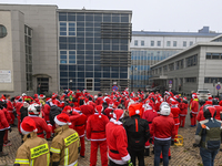 KRAKOW, POLAND - DECEMBER 08: Hundreds of motorcycle riders dressed as Santa Claus circle the Pediatric Hospital, shouting 'Ho Ho Ho' and wa...