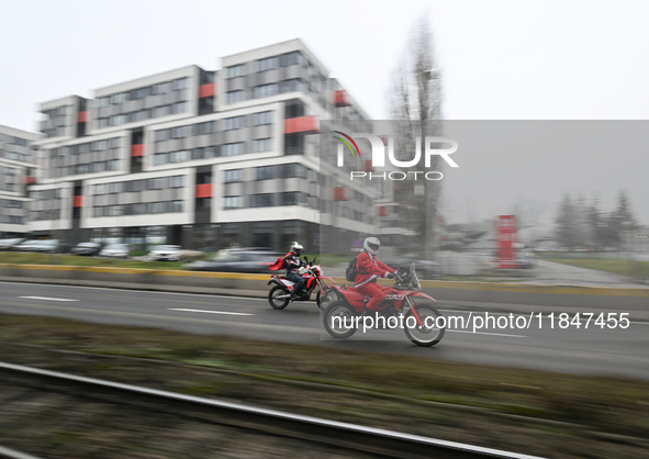 KRAKOW, POLAND - DECEMBER 08: Motorcycle riders dressed as Santa Claus seen after delivering Christmas gifts to young patients at the Pediat...