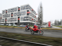 KRAKOW, POLAND - DECEMBER 08: Motorcycle riders dressed as Santa Claus seen after delivering Christmas gifts to young patients at the Pediat...